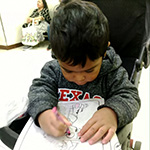 Zoe who needs a special hearing aid